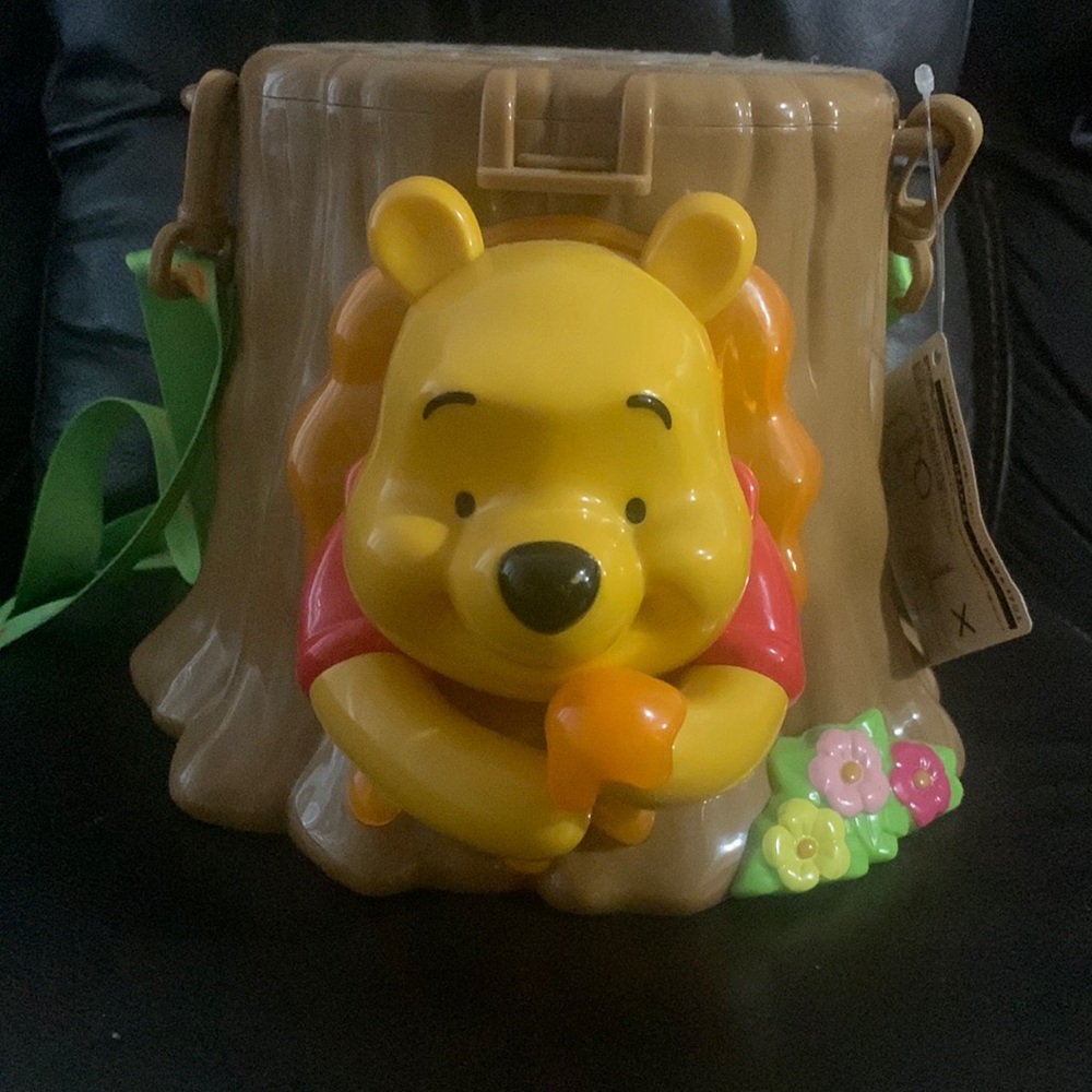 Used Winnie the Pooh popcorn bucket.